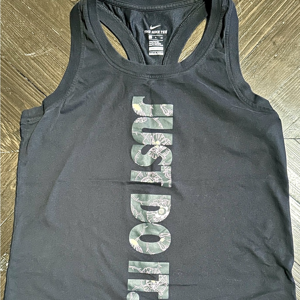 Nike women’s tank top, size small, dri-fit material, athletic cut